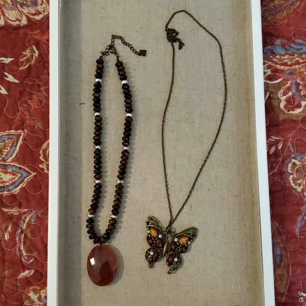 Two brown necklaces